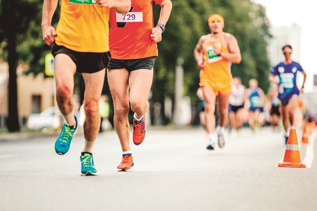 Men Athletes Runners In Bright Color T-shirts Running City Race
