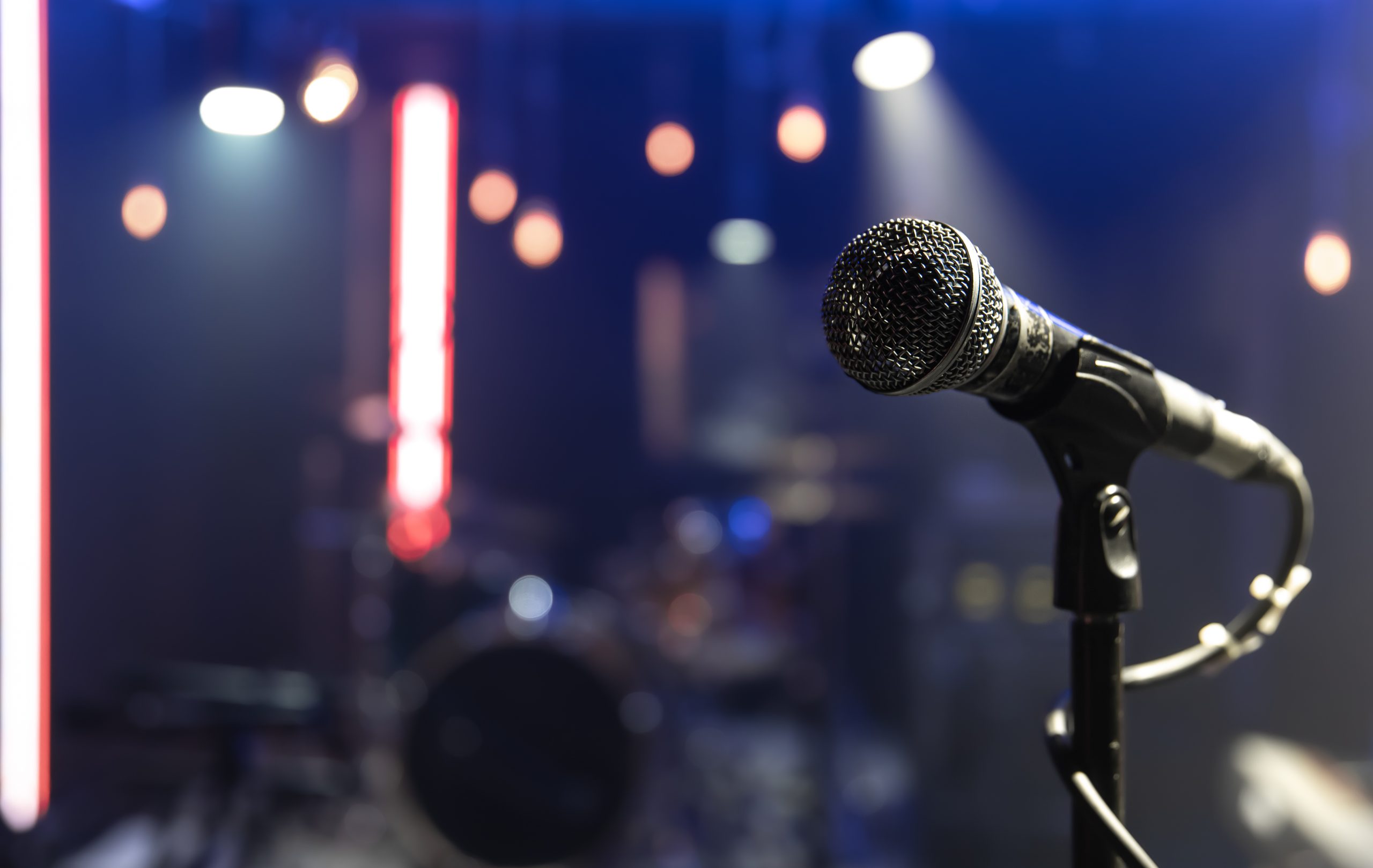 Close up microphone on blurred background with bokeh.